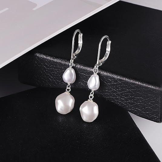 Elegant silver drop earrings featuring double white pearls, designed for a timeless and sophisticated look